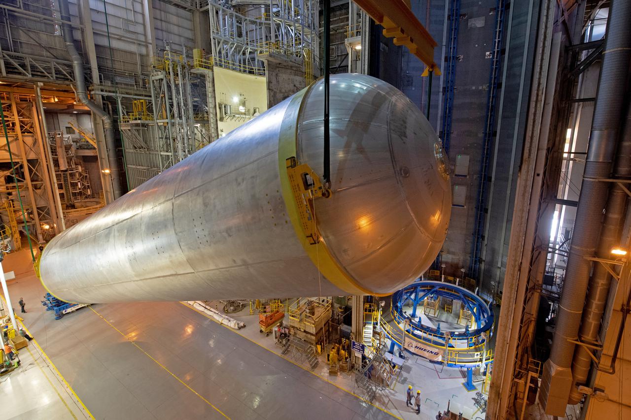 This image highlights the liquid hydrogen tank that will be used on the core stage of NASA’s Space Launch System rocket for Artemis II, the first crewed mission of NASA’s Artemis program. The tank is being built at NASA’s Michoud Assembly Facility in New Orleans. The SLS core stage is made up of five unique elements: the forward skirt, liquid oxygen tank, intertank, liquid hydrogen tank, and the engine section. The liquid hydrogen tank holds 537,000 gallons of liquid hydrogen cooled to minus 423 degrees Fahrenheit and sits between the core stage’s intertank and engine section. The liquid hydrogen hardware, along with the liquid oxygen tank, will provide propellant to the four RS-25 engines at the bottom of the cores stage to produce more than two million pounds of thrust to launch NASA’s Artemis missions to the Moon. Together with its four RS-25 engines, the rocket’s massive 212-foot-tall core stage — the largest stage NASA has ever built — and its twin solid rocket boosters will produce 8.8 million pounds of thrust to send NASA’s Orion spacecraft, astronauts and supplies beyond Earth’s orbit to the Moon and, ultimately, Mars. Offering more payload mass, volume capability and energy to speed missions through space, the SLS rocket, along with NASA’s Gateway in lunar orbit, the human landing system, and Orion spacecraft, is part of NASA’s backbone for deep space exploration and the Artemis lunar program. No other rocket can send astronauts in Orion around the Moon in a single mission.